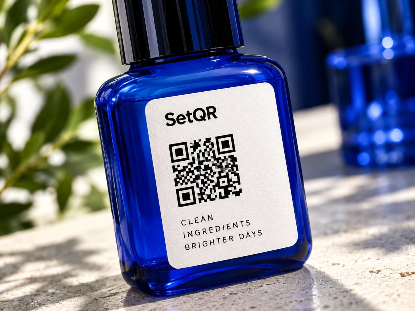 A cobalt glass bottle with a cream SetQR product label.